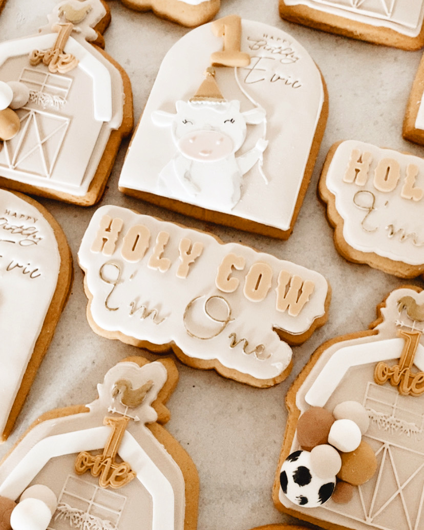 Hand-decorated Surf Coast cookies with edible art, custom colours and designs 1st birthday farm theme